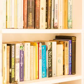 Well stocked bookshelves - something for everyone here Well stocked bookshelves - something for everyone here