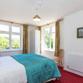 Bedroom 11 twin aspect widows giving loads of light over the garden River Wye Lodge 12 bedroom holiday accommodation in the Wye Valley www.bhhl.co.uk Bedroom 11 twin aspect widows giving loads of light over the garden River Wye Lodge 12 bedroom holiday accommodation in the Wye Valley www.bhhl.co.uk