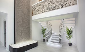 Bluewater: The hallway - a waterfall and a bespoke staircase