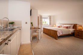 Quantock Barns - Double Tree is a ground floor suite with a super king bed, an ensuite shower room and a kitchen area