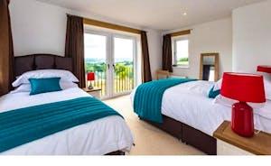 Twin bedroom scenic  country side views Orchard House family and friends holiday accommodation  Wales www.bhhl.co.uk