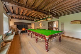 Perys Hill - The Farmhouse: The games room, with its original wooden ceiling