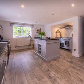 Our well equipped spacious kitchen Our well equipped spacious kitchen