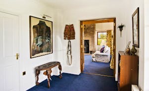 Large hall way with interesting artefacts - High Cloud Farm and Barn sleeps 24 people self catering accommodation www.bhhl.co.uk