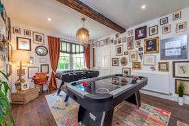 Hunky-Dory - One of the games rooms has air hockey, table football and a whole wall of the Wiltshire Estate and Longleat history.  