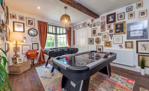 Hunky-Dory - One of the games rooms has air hockey, table football and a whole wall of the Wiltshire Estate and Longleat history.  