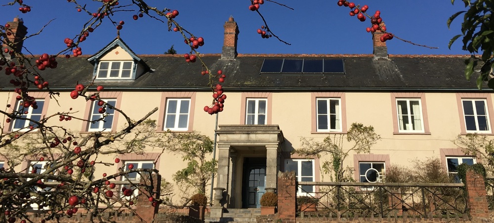 Hurstone House against a bright blue winters sky