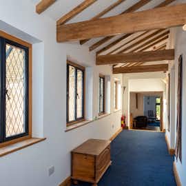 Leaded pained windows first floor landing over looking the patio area friends and family self catering accommodation Manor on the Monnow Monmouthshire www.bhhl.co.uk  Leaded pained windows first floor landing over looking the patio area friends and family self catering accommodation Manor on the Monnow Monmouthshire www.bhhl.co.uk