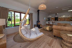 Whimbrels Barton - Curlews Halt: Upstairs the open plan living space has a wonderful hygge feel