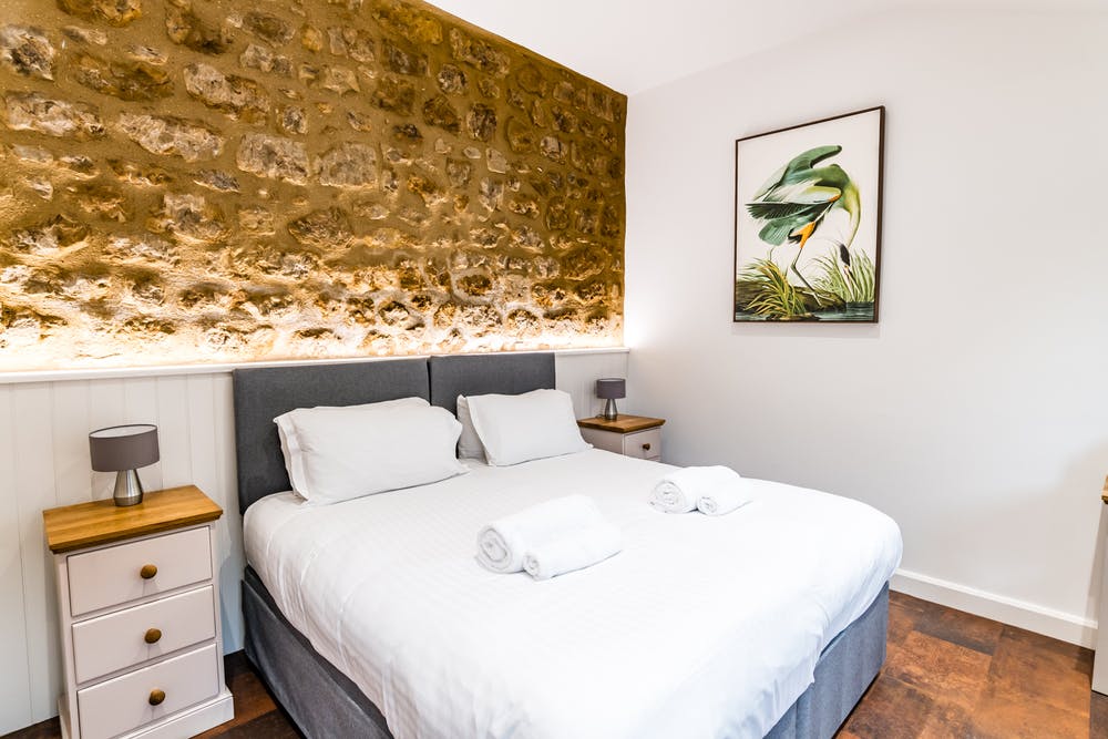 Bedroom 7 at Churchill with en-suite shower room and plenty of character features