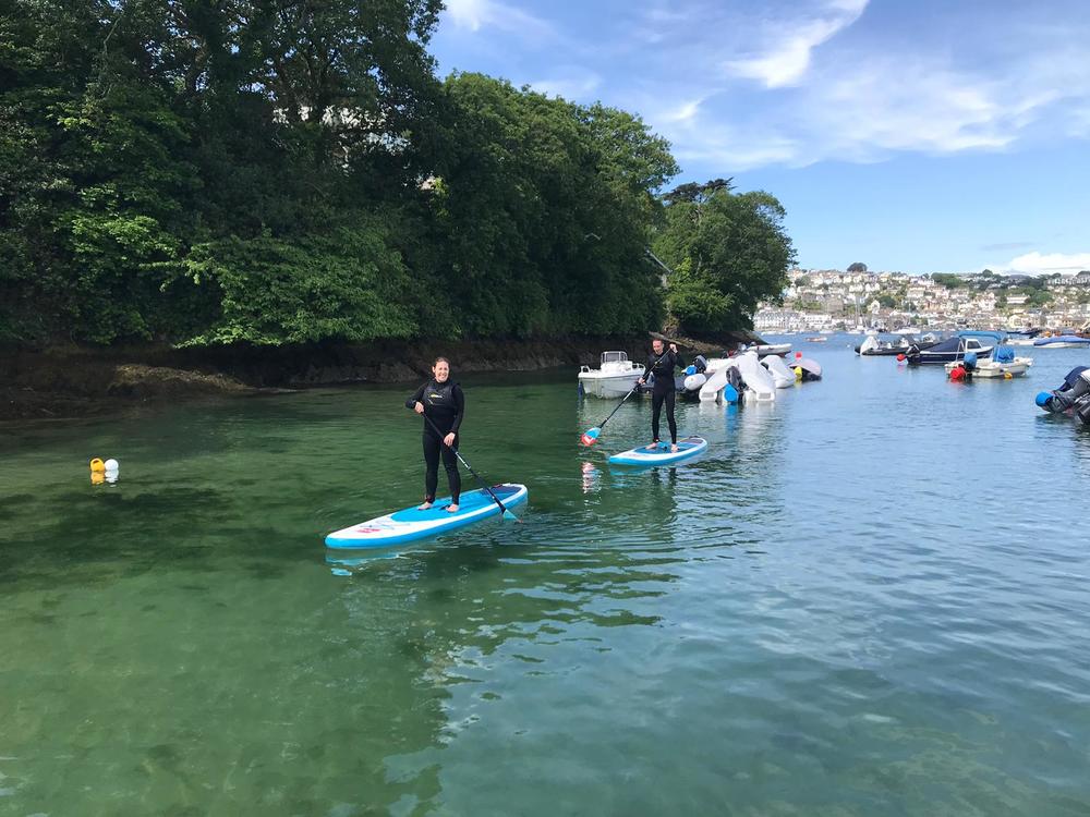 Peaceful paddle boarding along the coastline