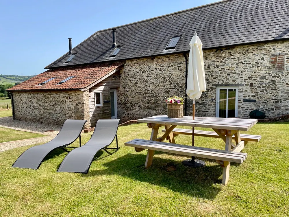 Sun loungers & picnic table at Stonehayes