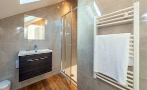 Shires - Bedroom 6 has a sleek and stylish en suite shower room