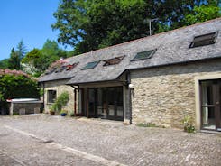 .... imaginatively converted coachhouse and stables