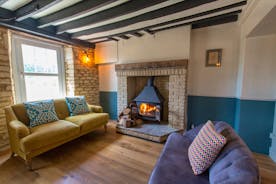 The Plough - Velvet sofas by the wood-burner - seriously tempting!