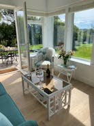 Sunroom - a  beautiful space to relax with friends and family 
