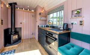 Sweet Chestnut - A Shaker style kitchen with an oven, hob and fridge