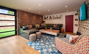 Pigertons - Soft seating to one end of the huge open plan living space