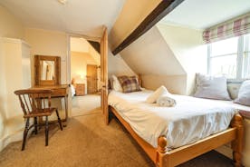 A single pine bed in its own room off the family rooms in the eves at Forest House Large holiday let in Coleford - www.bhhl.co.uk