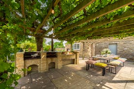 The Plough - Idle away the hours with a leisurely lunch beneath the arbour