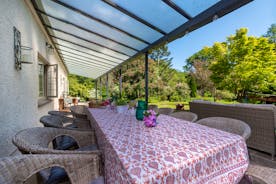 Babblebrook - The veranda runs along the entire length of the house, perfect for outdoor dining