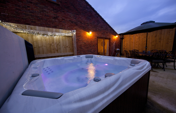 Holiday barns in Somerset at the foot of the Quantock hills, sleeps 14 with hot tub and games room