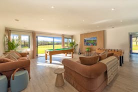 Fuzzy Orchard - The light and airy games room, with views over the fields