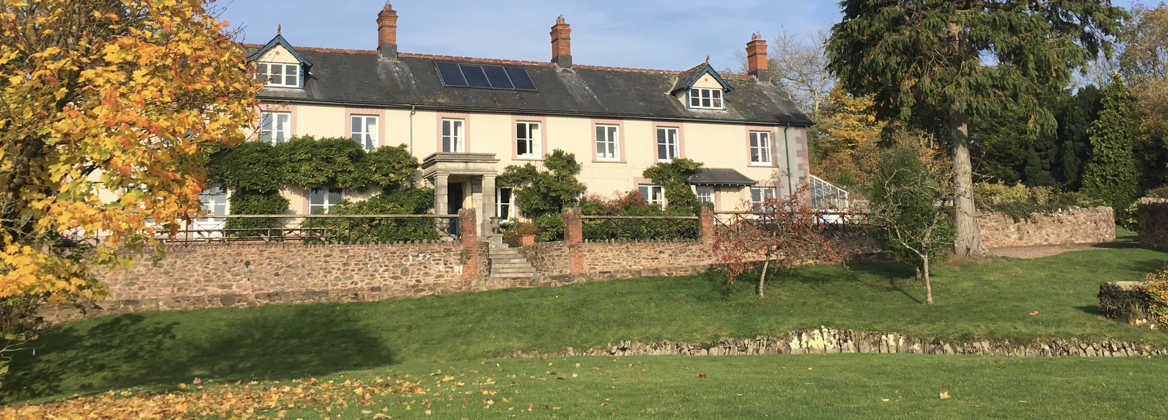 Hurstone House , autumn trees. 