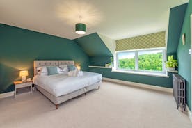 Wonham House - Bedroom 8 is on the second floor and has wonderful views over the wooded valley