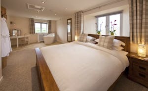 Quantock Barns - The Wagon House: Bedroom 1 has a king size bed and an ensuite shower room