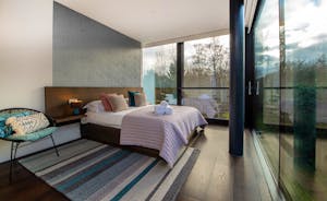 The Glass House on the Lake - Bedroom 2: All bedrooms have electronically operated blinds