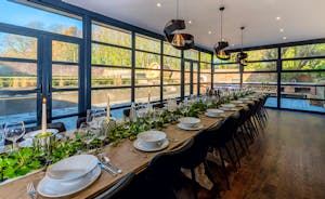 Hunky-Dory - The glass walled dining room overlooks the garden