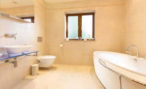 Hamble House - The shared bathroom for Bedroom 4 and 5 has a modern free standing bath and a separate shower