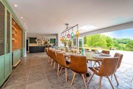 Duxhams - The dining room; a bar to one side, bi-fold doors to the other