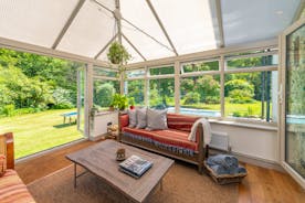Babblebrook - The conservatory opens onto the terrace and gardens at the side of the house