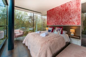The Glass House - Bedroom 3: The Pink Room; the treetops whisper just outside