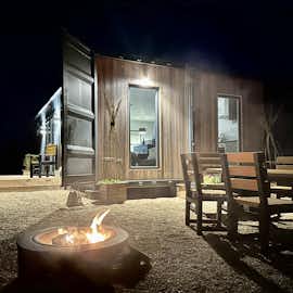 Outdoor area with fire pit. Outdoor area with fire pit.