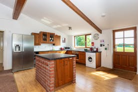 kitchen space in barn accommodation High Cloud Farm Large Family Holidays Monmouthshire www.bhhl.co.uk