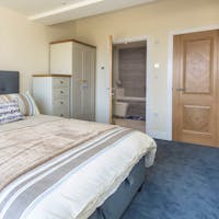 Bedroom 2 with ample storage and en suite Bedroom 2 with ample storage and en suite