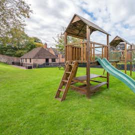 The Old Rectory - A climbing fort, swings, a slide, heaps of room to let off steam..... happy children!  The Old Rectory - A climbing fort, swings, a slide, heaps of room to let off steam..... happy children!