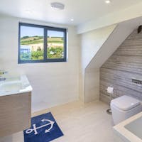 Master bedroom en suite with his and hers sinks Master bedroom en suite with his and hers sinks
