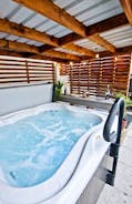 Relax in a hot tub after exploring the Forest of Dean