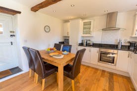 Siskins Nook, Stonehayes Farm - To one end of the ground floor living space is a well-equipped kitchen and dining area