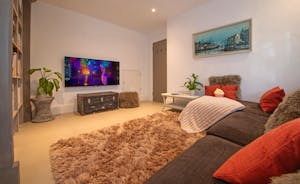 Tides Reach - Cosy up to watch a movie in the TV Room