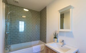 The Plough - A tastefully finished modern bathroom with overhead shower for Bedroom 4