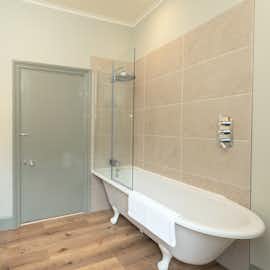 Kennard Hall - The family bathroom is the perfect blend of antique and modern Kennard Hall - The family bathroom is the perfect blend of antique and modern