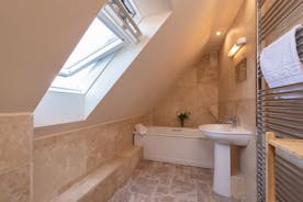 Thorncombe - The ensuite bathroom for Bedroom 4 