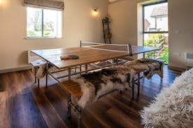 Whimbrels Barton - The dining table in the living/entertaining room can also be used for ping-pong