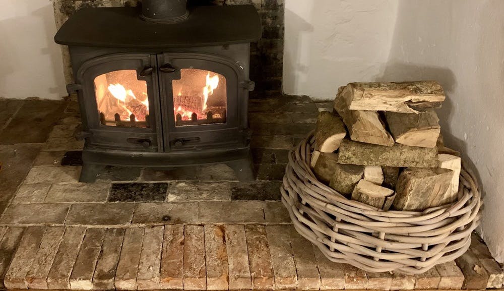 Log burner at Stonehayes Farm