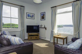 Double aspect windows in the living area, offering fabulous Salcombe Harbour views 